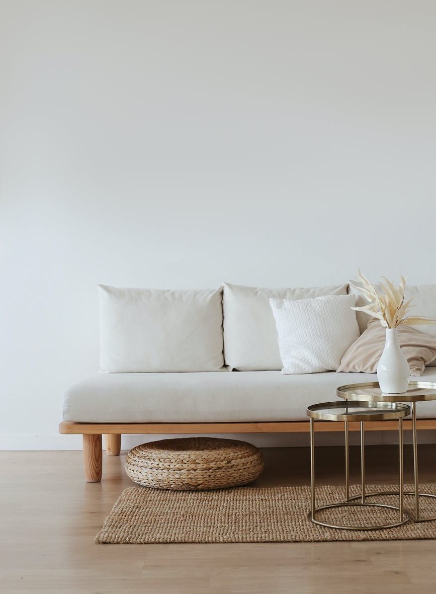 white couch on wooden floor